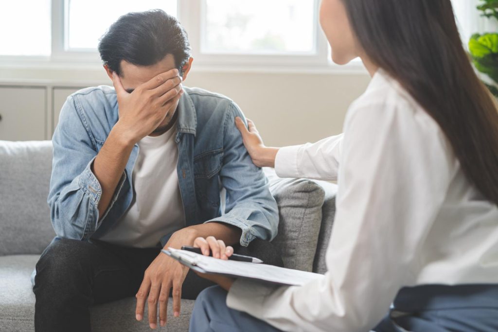 A therapist consulting an adjustment disorder patient